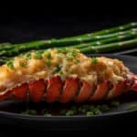 A sumptuous plate of Lobster Thermidor and grilled asparagus with lemon gremolata