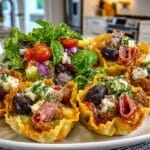 Antipasto Salad in Parmesan Cups served with “Armando Organic Bowtie Pasta” with my Momma's Ragu